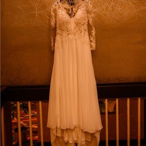 Wedding dress and cape style veil